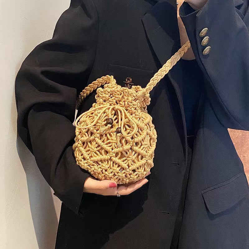 Hand-knotted shoulder bag with playful animal motif Skanto