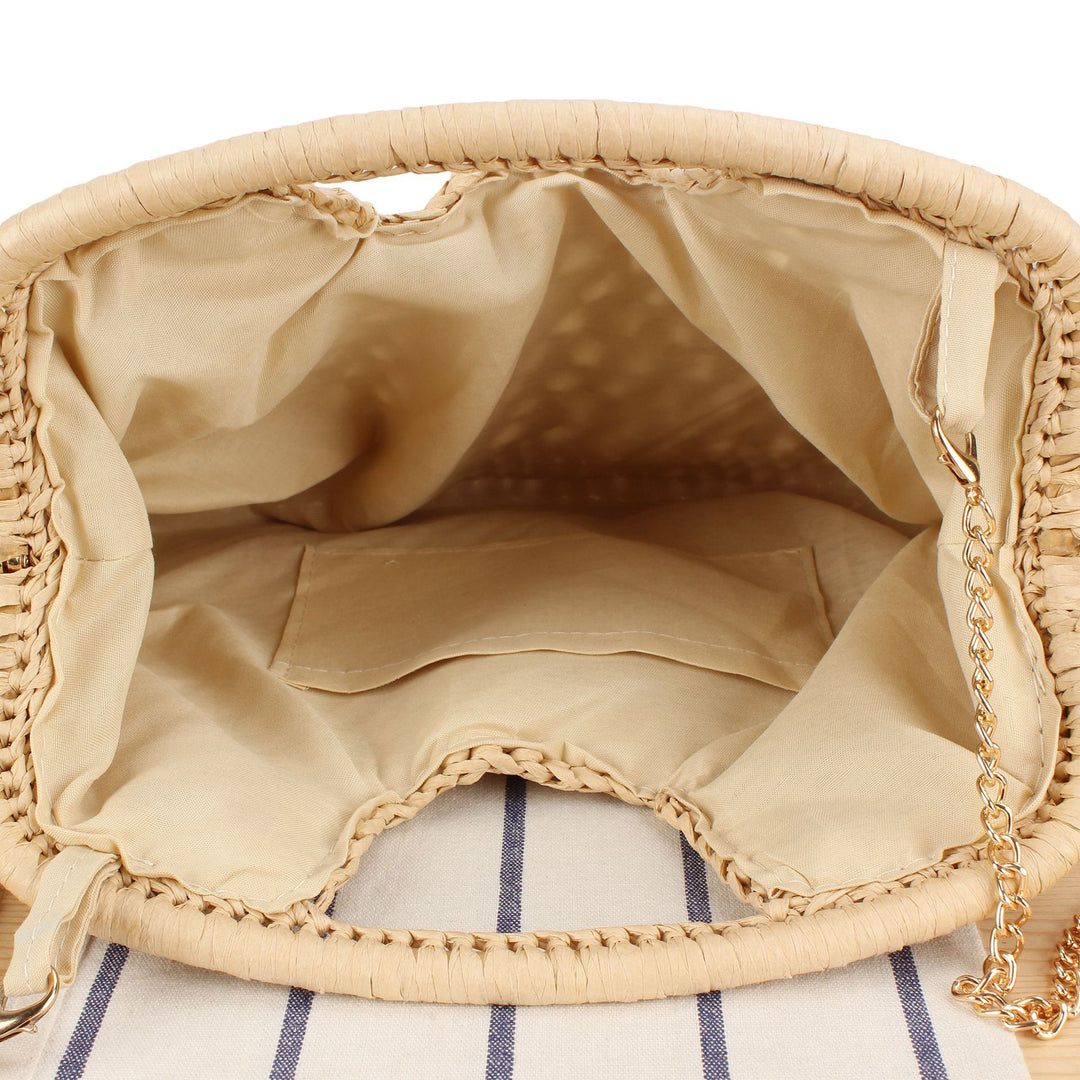 Handbag made of naturally coated braided material with elegant chain detail Skanto