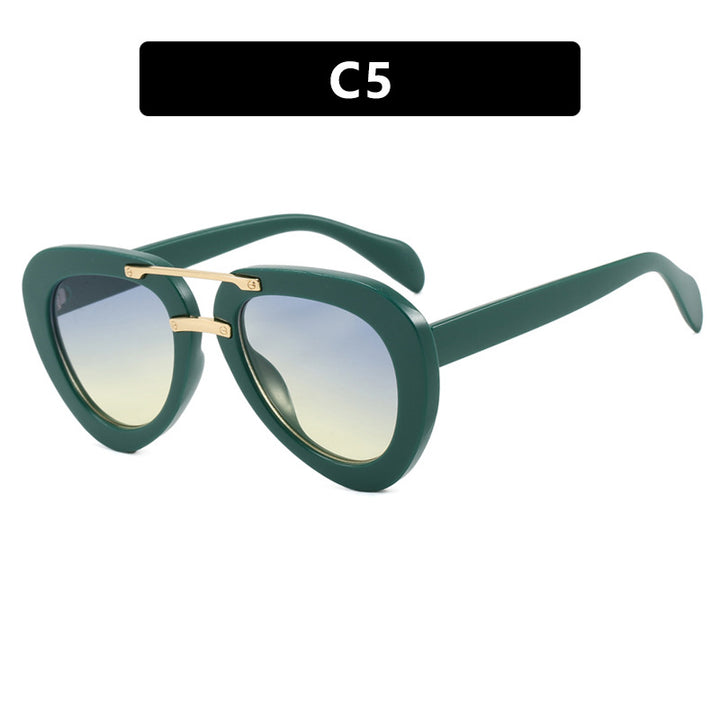 Women's extravagant sunglasses in modern heart design Skanto