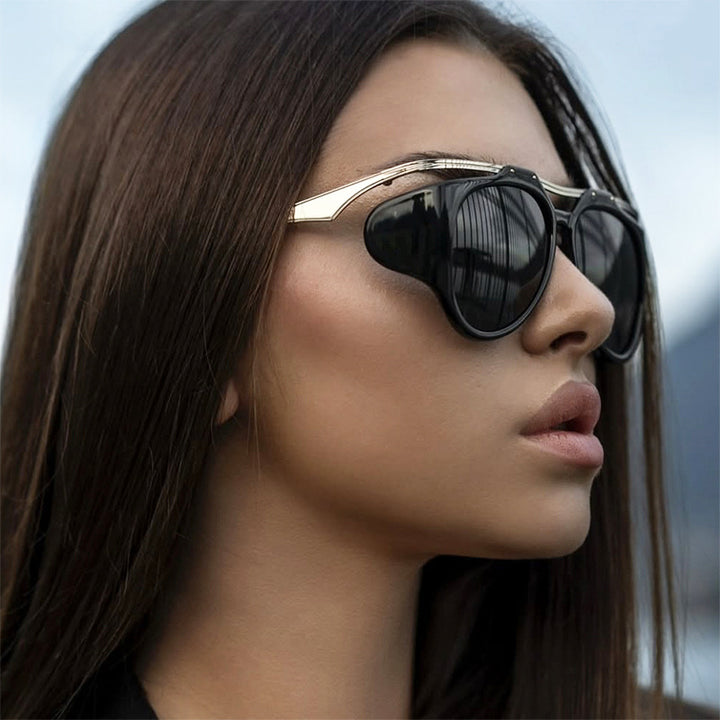 Dame Cat-Eye solbriller med unikt design og beskyttende glass Skanto