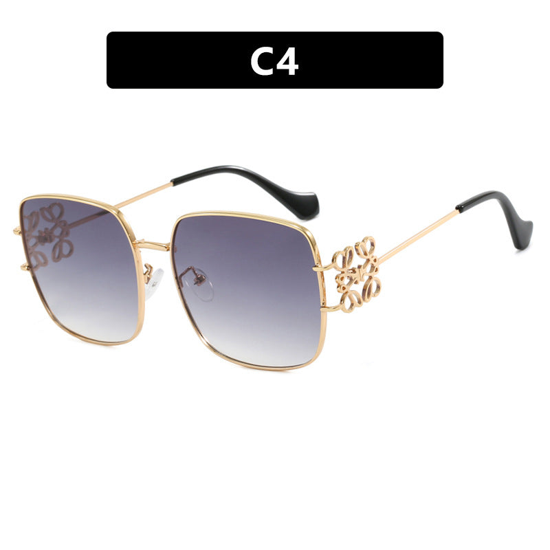 Women's square sunglasses with filigree design and luxurious metal frame Skanto