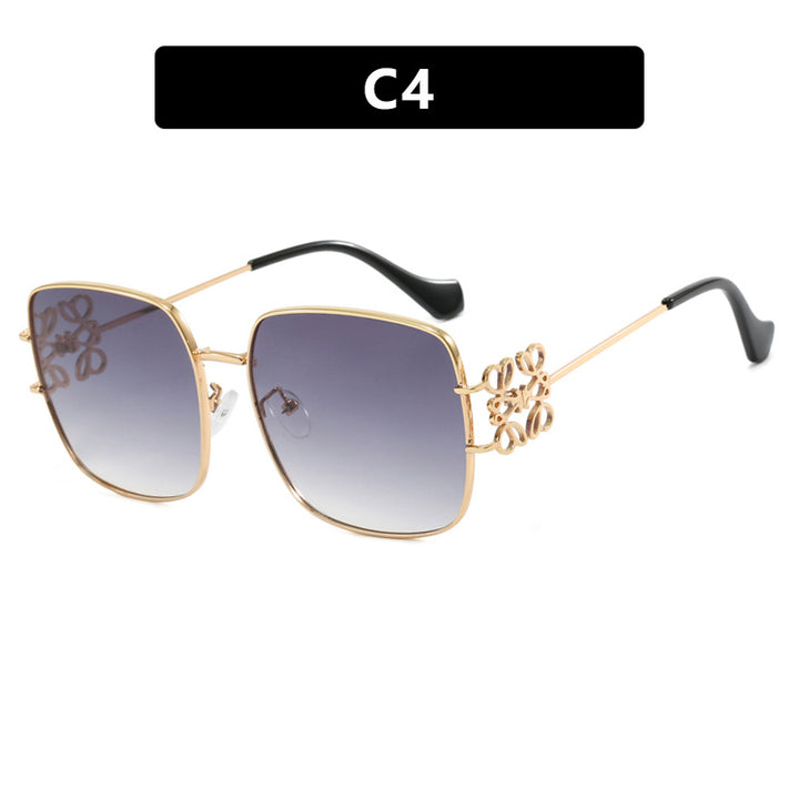 Women's square sunglasses with filigree design and luxurious metal frame Skanto