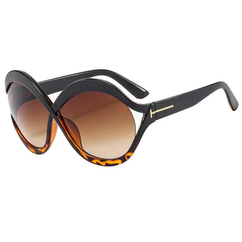 Dame ekstravagant formet solbrille Skanto