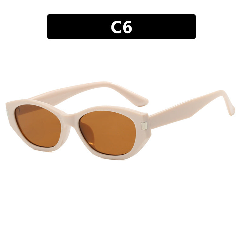 Dame moteklær Cat-Eye solbriller med elegant, transparent ramme Skanto