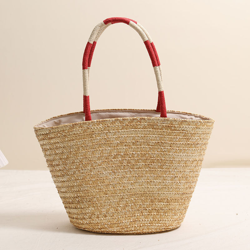 Handmade basket bag with vibrant floral embroidery design Skanto