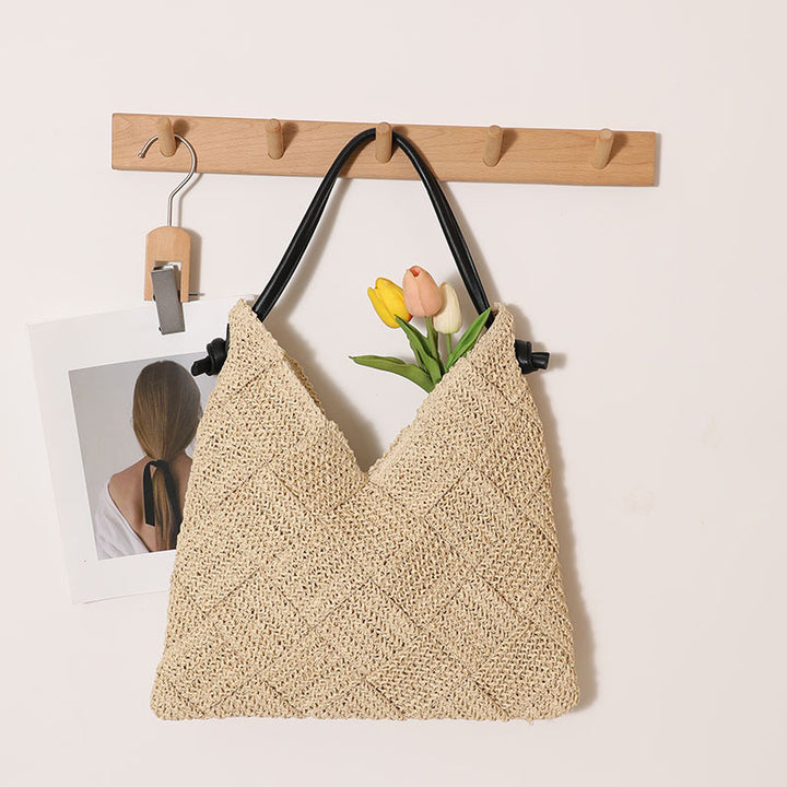 Braided shoulder bag made of natural materials Skanto