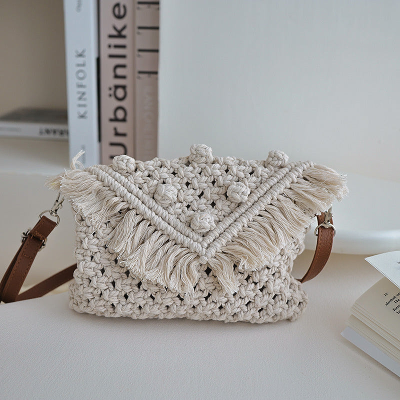 Handmade modern shoulder bag with fringe and decorative details Skanto