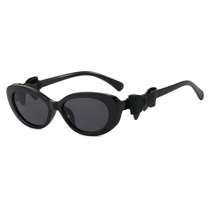 Dame moteriktig solbrille med lekent sløyfedesign Skanto