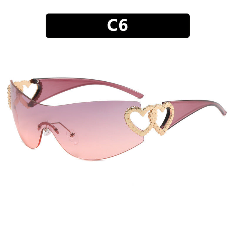 Dame Fashion-solbrille med hjerte-applikasjoner Skanto