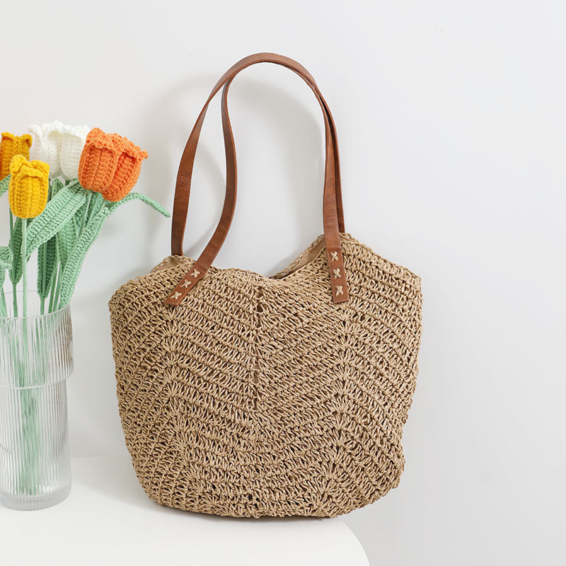 Braided basket bag with sturdy leather handles Skanto