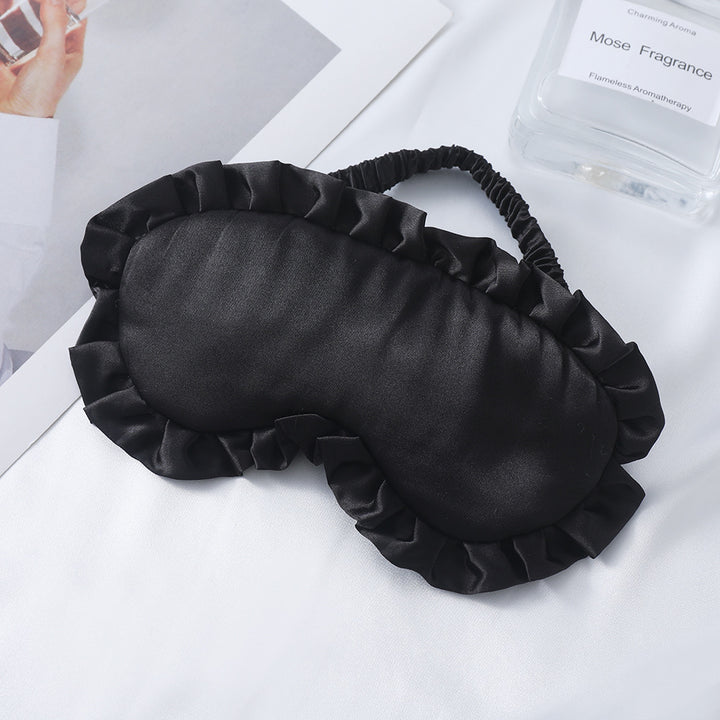 Dame nan satin-glinsende øyemaske med ergonomisk kontur, volangkant og myk polstring Skanto