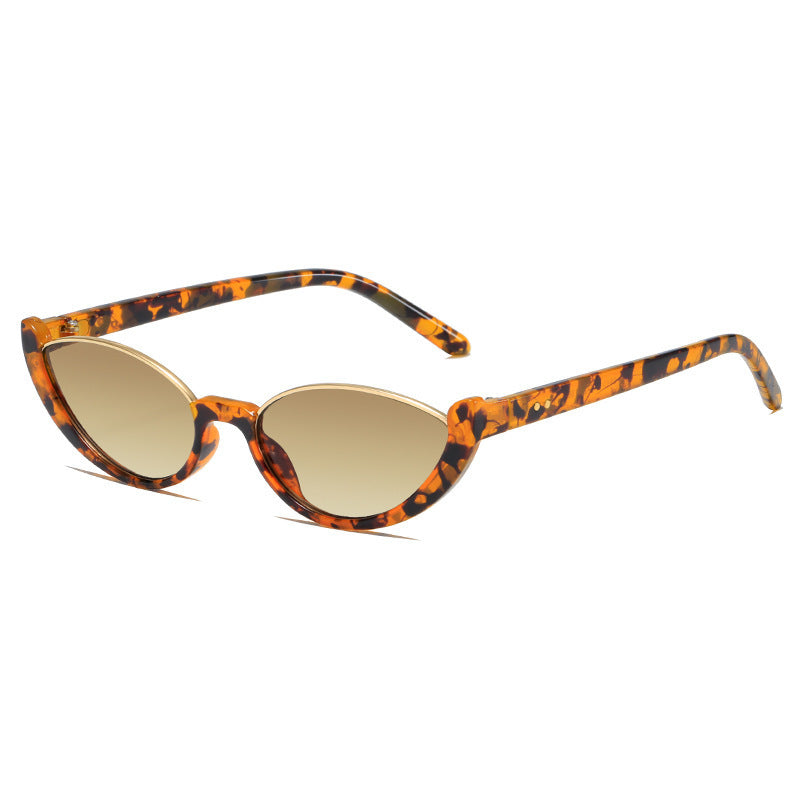 Dame Cat-Eye solbriller med diskret ramme og polarisert glass Skanto