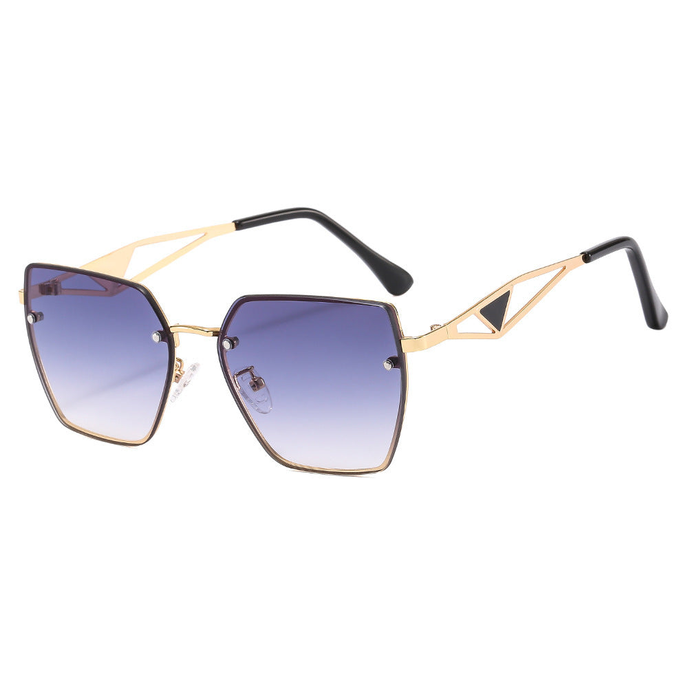 Dame geometrisk solbrille med filigran design Skanto