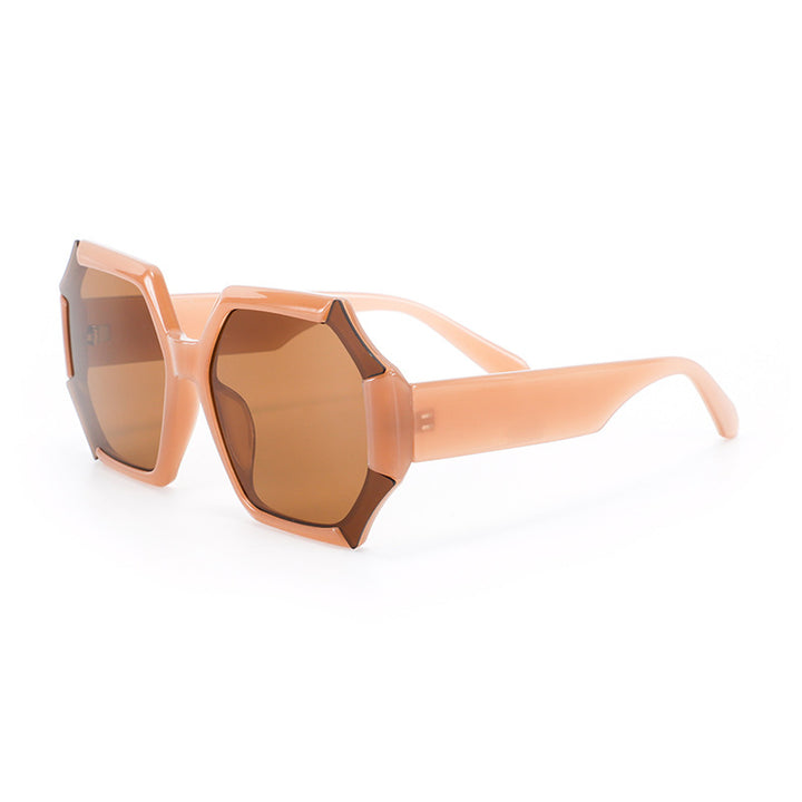 Dame moterelatert solbrille med fasettert ramme Skanto