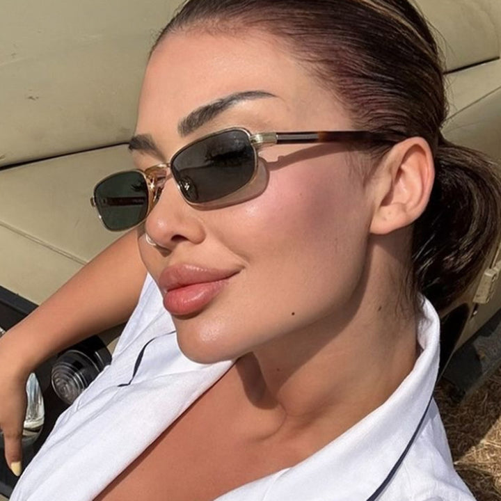 Women's fashionable sunglasses with stylish metal frame and orange lenses Skanto