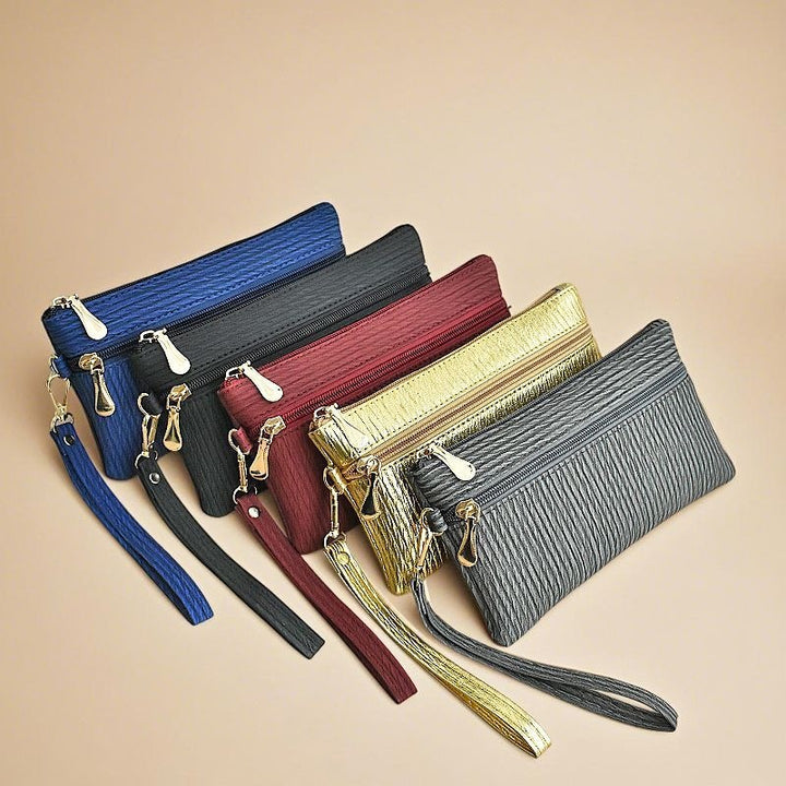Elegant Clutch Med Praktisk Håndleddsreim Skanto