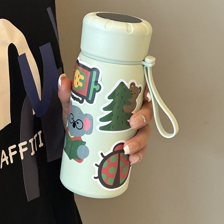 Damen stilvolle Wasserflasche mit witzigen Aufklebermotiven Skanto