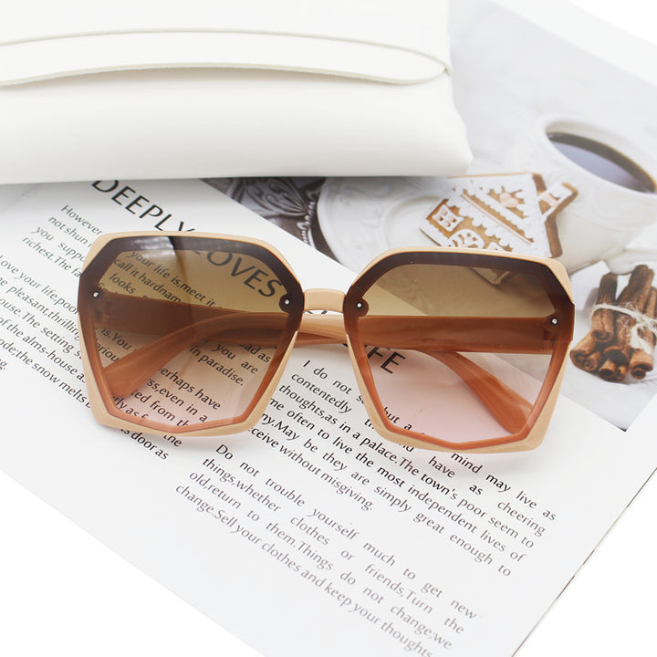 Dame Designer-solbrille i elegant hexagon-design Skanto
