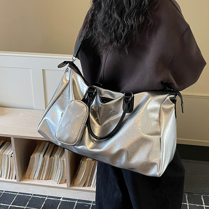 Elegant reiseveske i høykvalitets kunstlær Skanto
