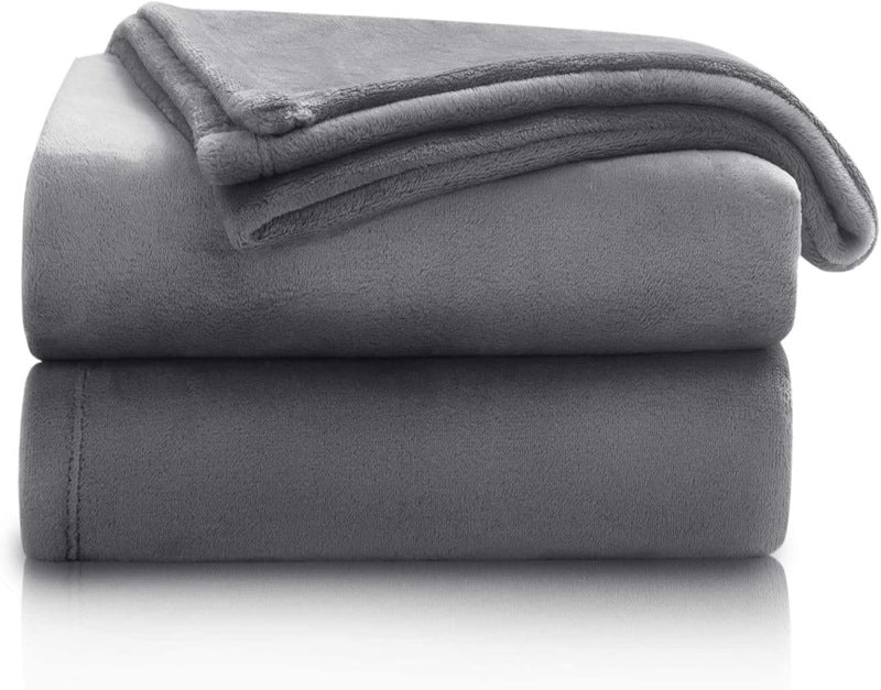 Damer luksuriøs kosepledd laget av høykvalitets mikrofiber Skanto