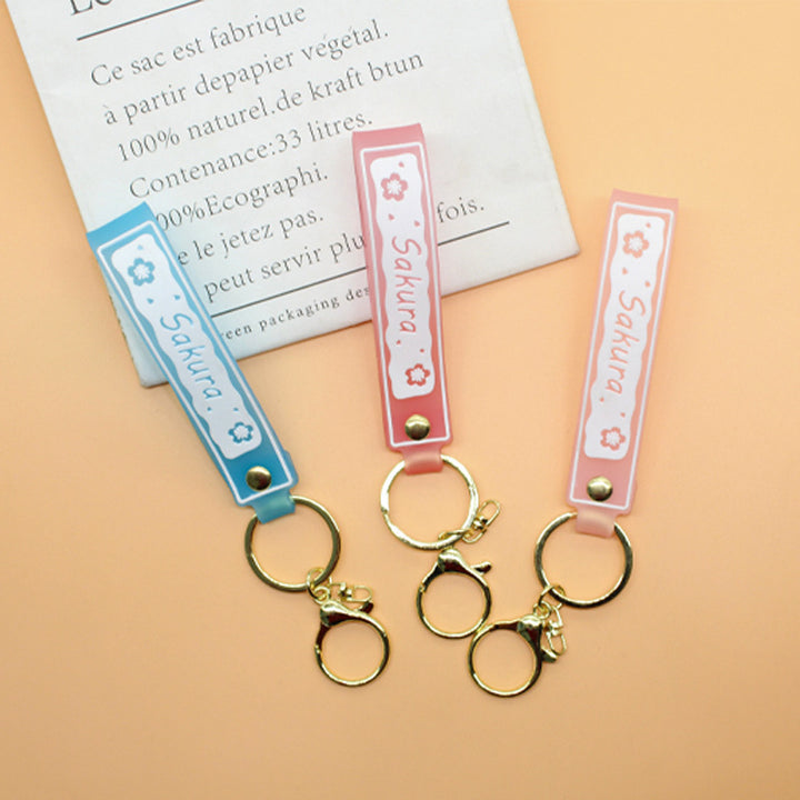 Unisex nøkkelring med blomstret design Skanto