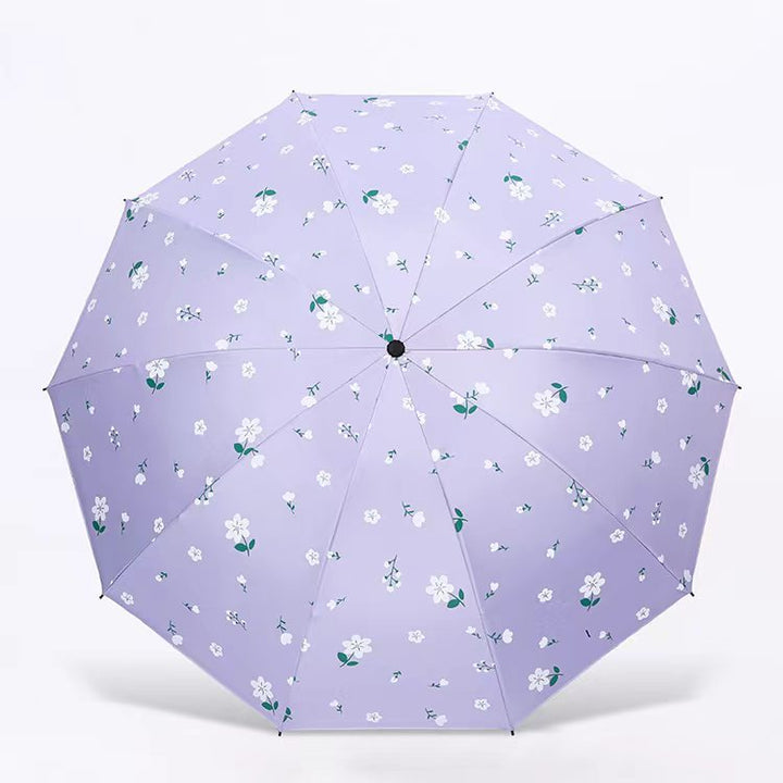 Dame paraply med blomsterdesign Skanto
