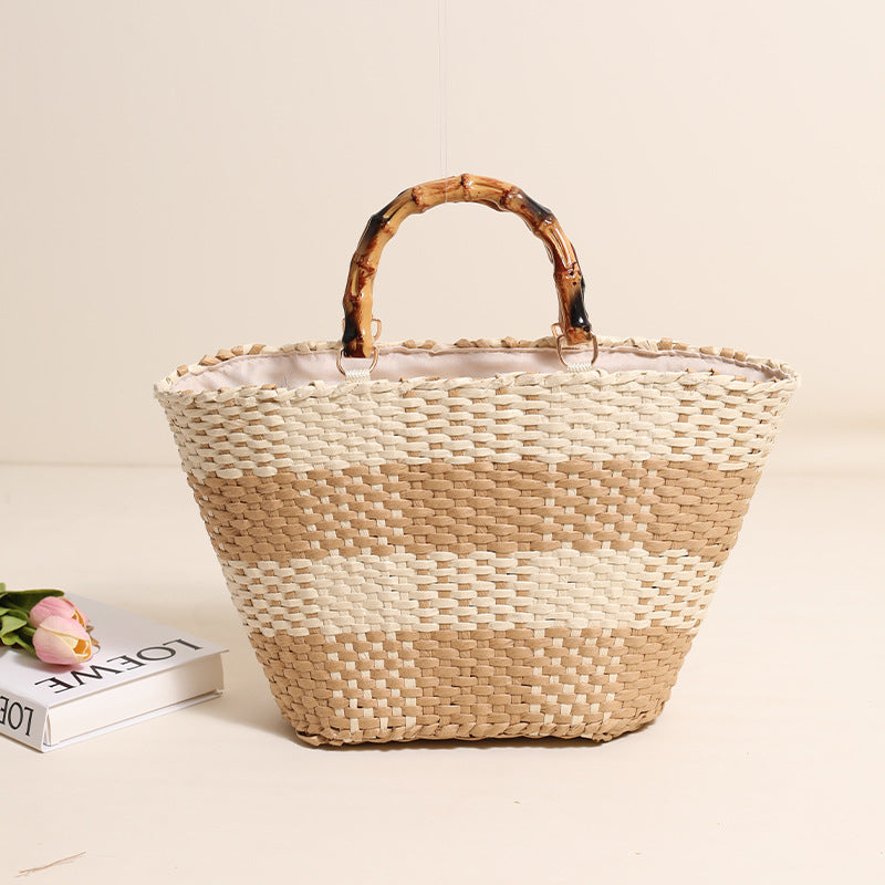 Braided straw bag with bamboo handle and decorative lining Skanto