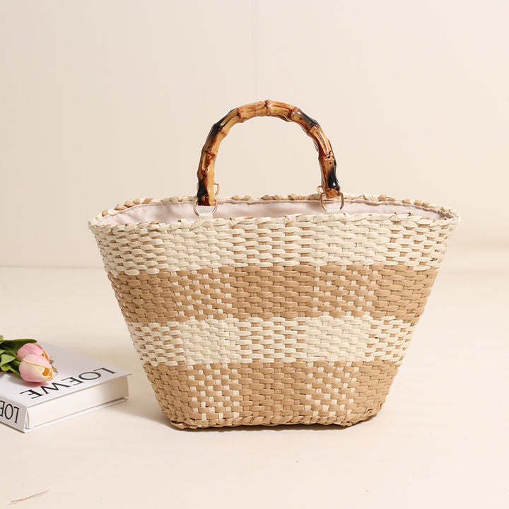 Braided straw bag with bamboo handle and decorative lining Skanto
