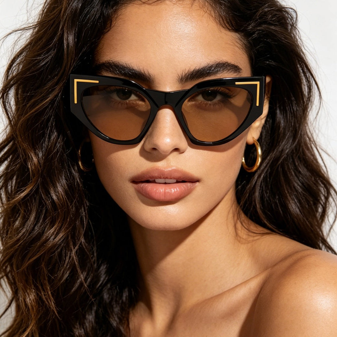 Dame kreativ Cat-Eye solbriller med transparent ramme og brune glass Skanto