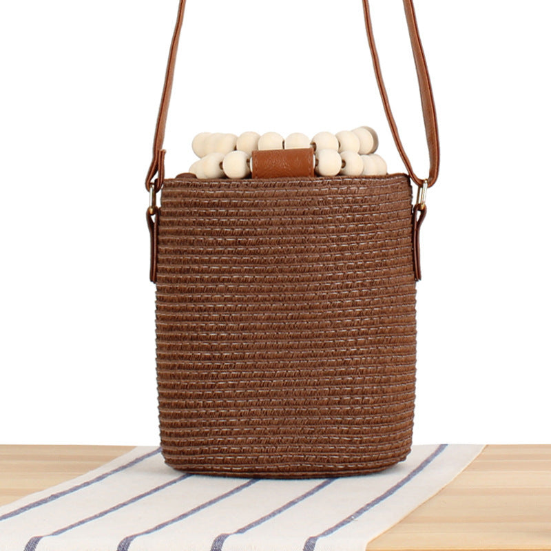 Handbag made of high-quality woven natural material with innovative lock Skanto