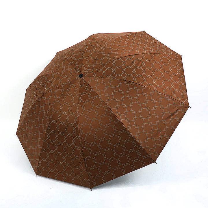 Kvinnenes sammenleggbare paraply med moderne geometrisk mønster Skanto