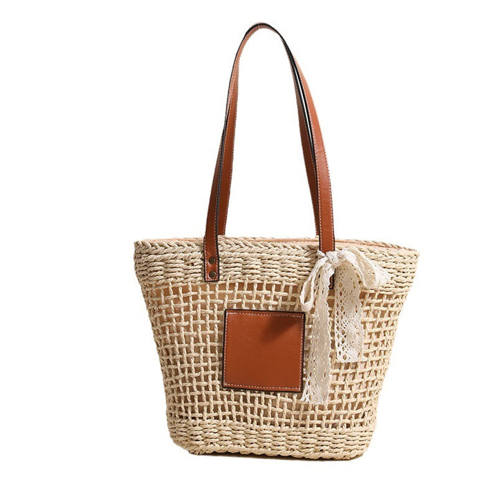 Handmade straw bag with elegant leather accents Skanto