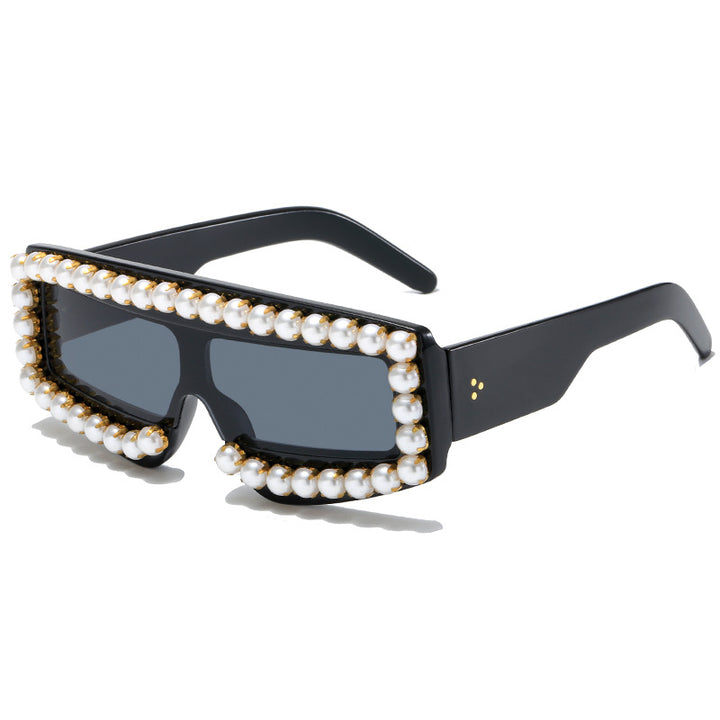 Dame moteriktig solbrille med perle-applikasjoner Skanto