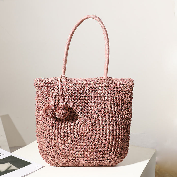 Handmade straw bag with pompom details Skanto