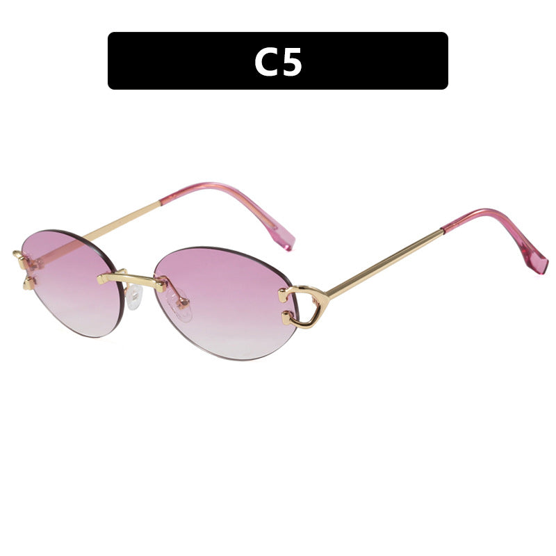 Women's elegant oval sunglasses with modern metal frame Skanto