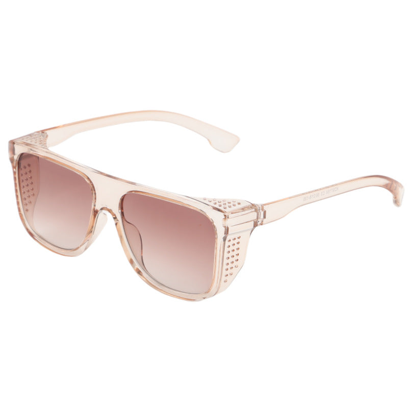 Dame moterik oversized solbrille med unik aksent Skanto