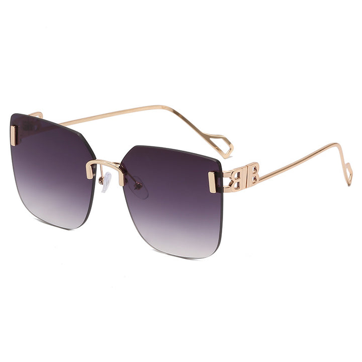 Dame elegant firkantet solbrille med gullfarget metalramme Skanto
