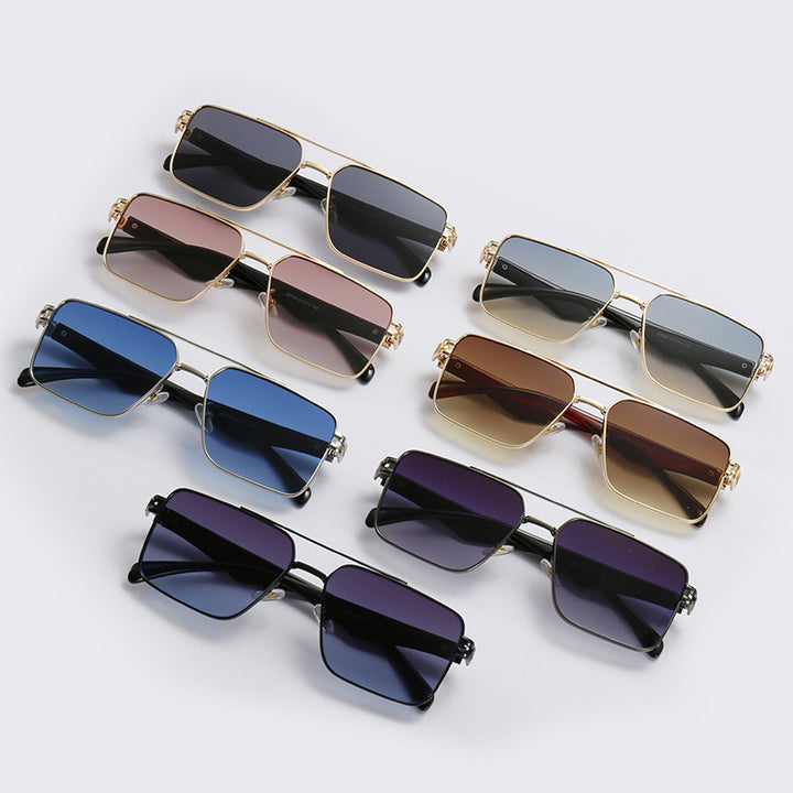 Dame designer solbrille med ekstravagant metallramme Skanto