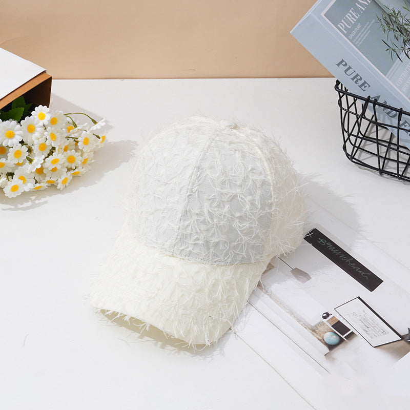 Kvinnebrodert teksturert baseballcap Skanto