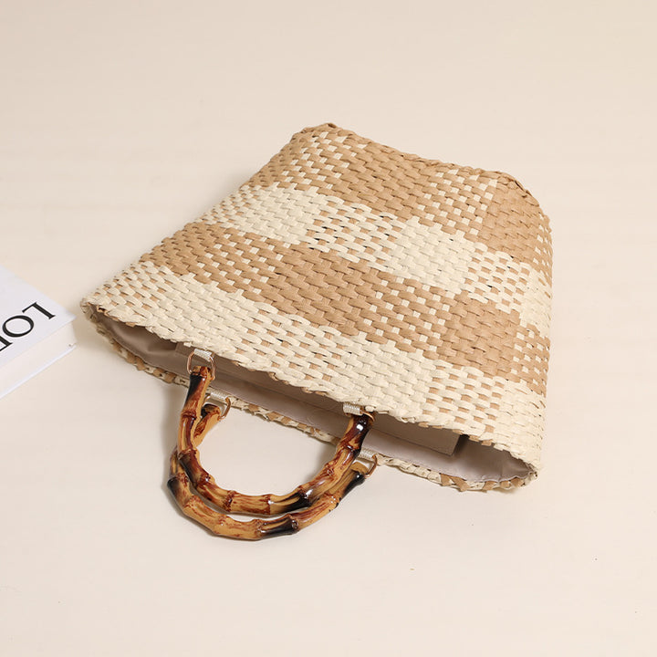 Braided straw bag with bamboo handle and decorative lining Skanto
