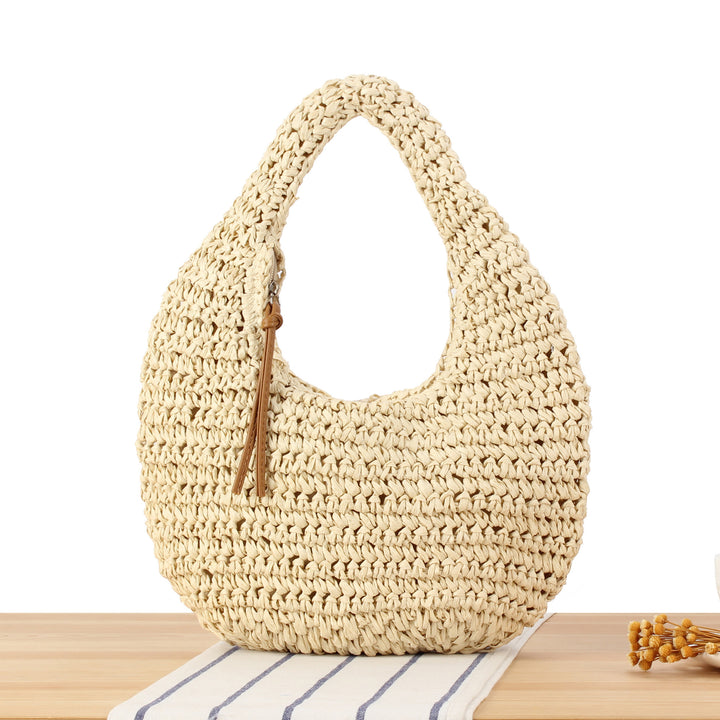 Hand-knotted shoulder bag in natural material Skanto