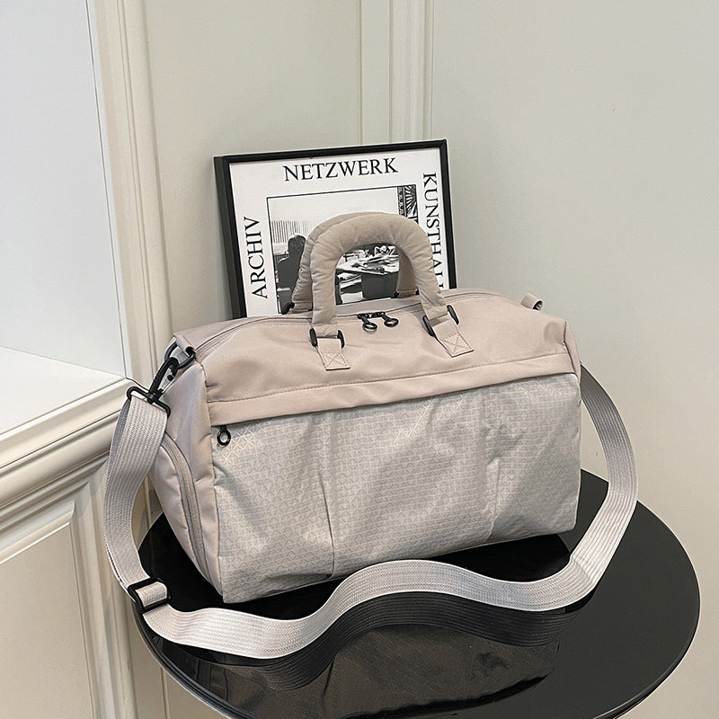 Sporty skulderveske med justerbar skulderstropp Skanto