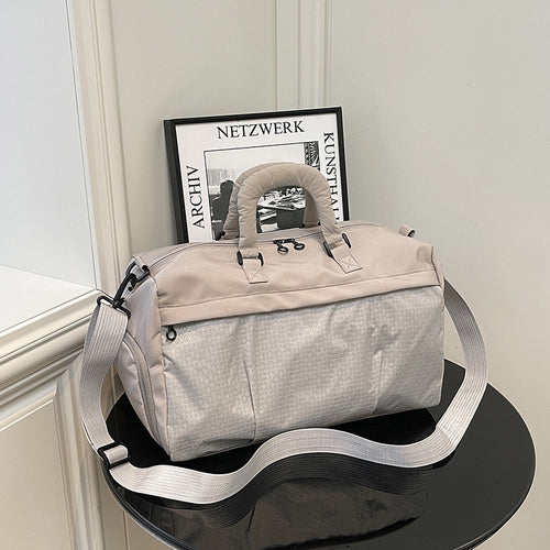 Sporty skulderveske med justerbar skulderstropp Skanto