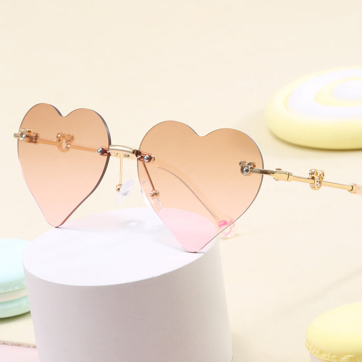 Dame hjerteformet solbrille med speilende linser Skanto