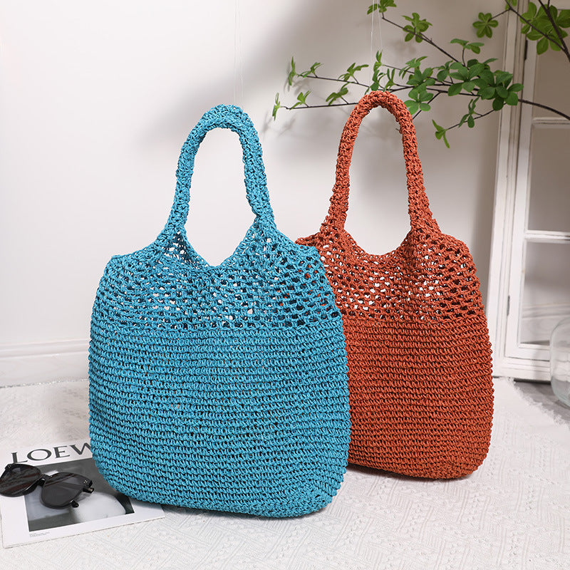 Hand-knotted raffia bag with long carrying handles Skanto