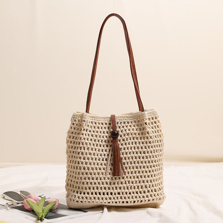 Hand-knotted basket bag with elegant leather handle Skanto