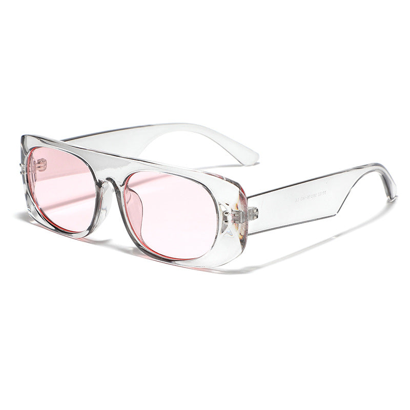 Dame moteriktig solbrille med transparant og geometrisk ramme Skanto