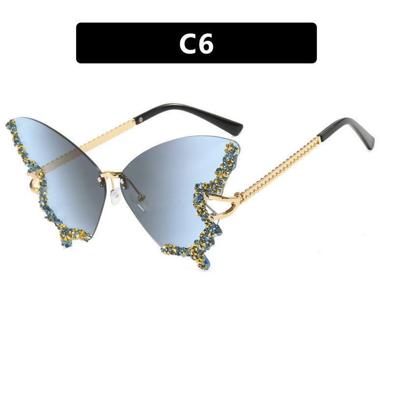 Women's large cat-eye sunglasses with sparkling rhinestone decoration and elegant frame Skanto