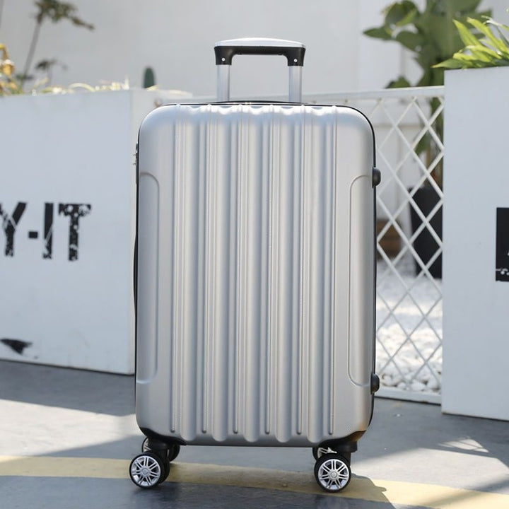 Hardsided suitcase with 360-degree rolling system and integrated safety feature Skanto