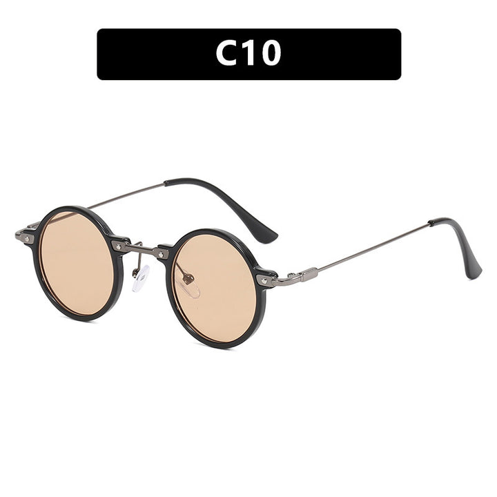 Dame rund solbrille med moderne metallramme og store blå linser Skanto